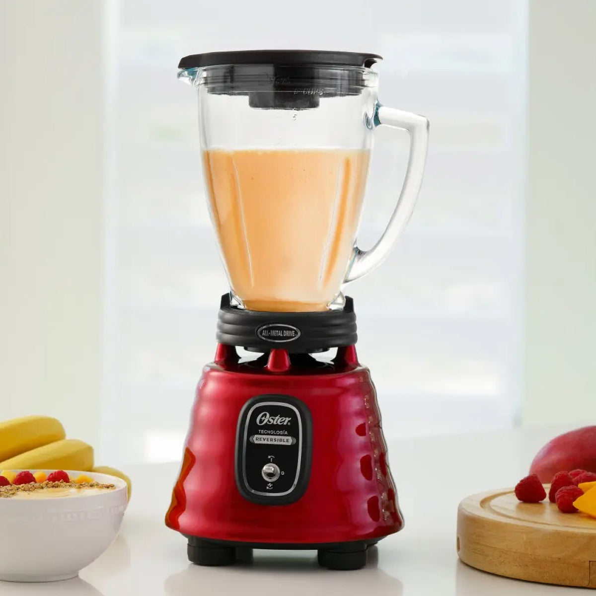 Licuadora 1 Velocidad + Pulso Reversible Vaso de Vidrio Rojo con Vaso Blend-N-Go Oster BLSTBESTR013